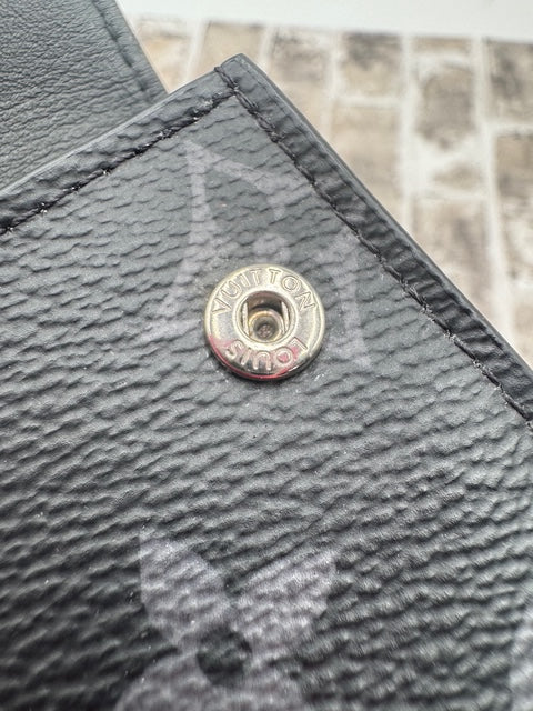 Louis Vuitton Reverse Monogram Eclipse Discovery Compact Wallet