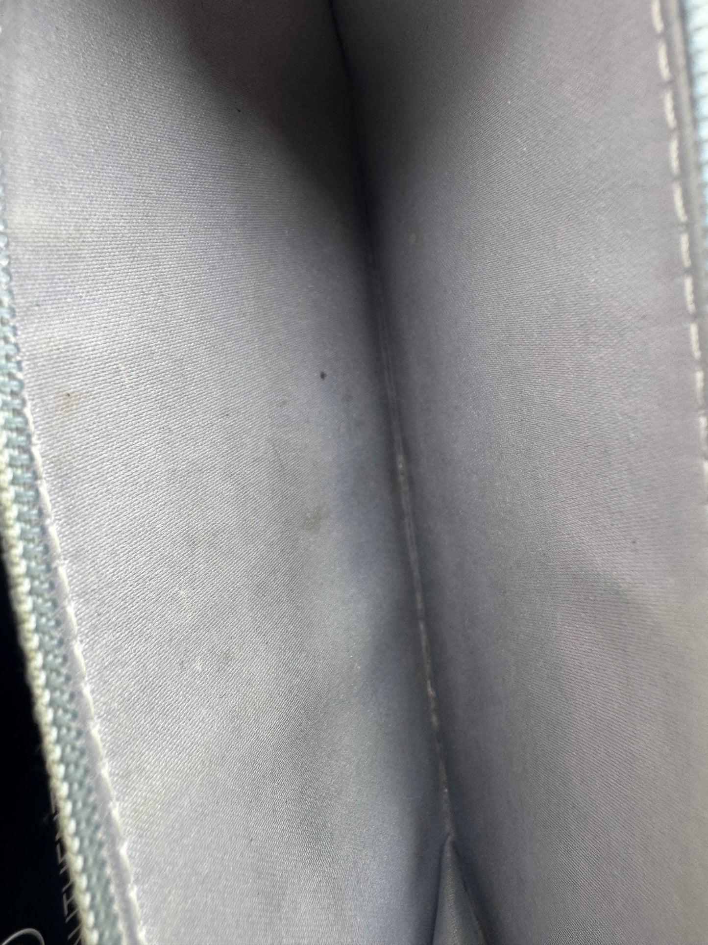 Chanel Camellia Embossed Large Flap Wallet