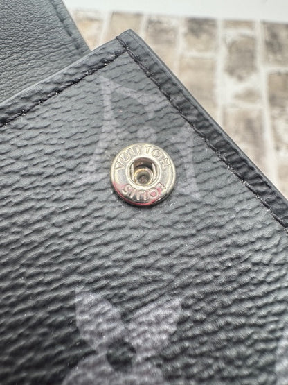 Louis Vuitton Reverse Monogram Eclipse Discovery Compact Wallet
